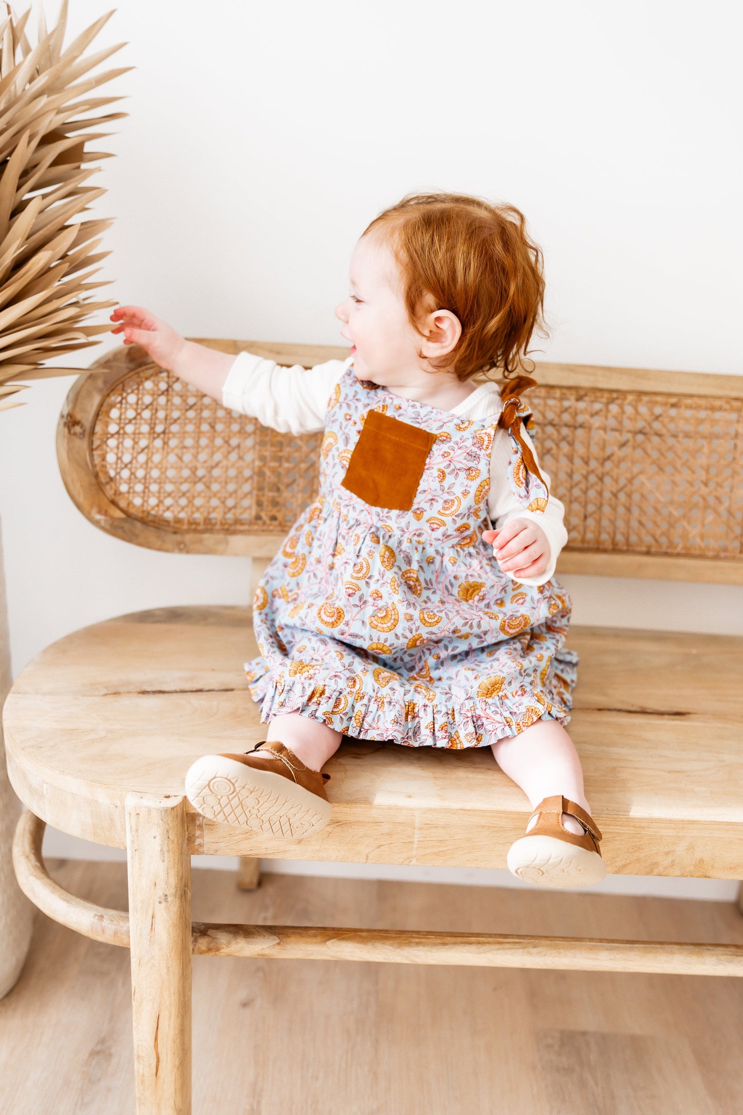 Reversible Solid Rust Corduroy & Rust Floral Printed Ruffle Dress DRESS Yo Baby India