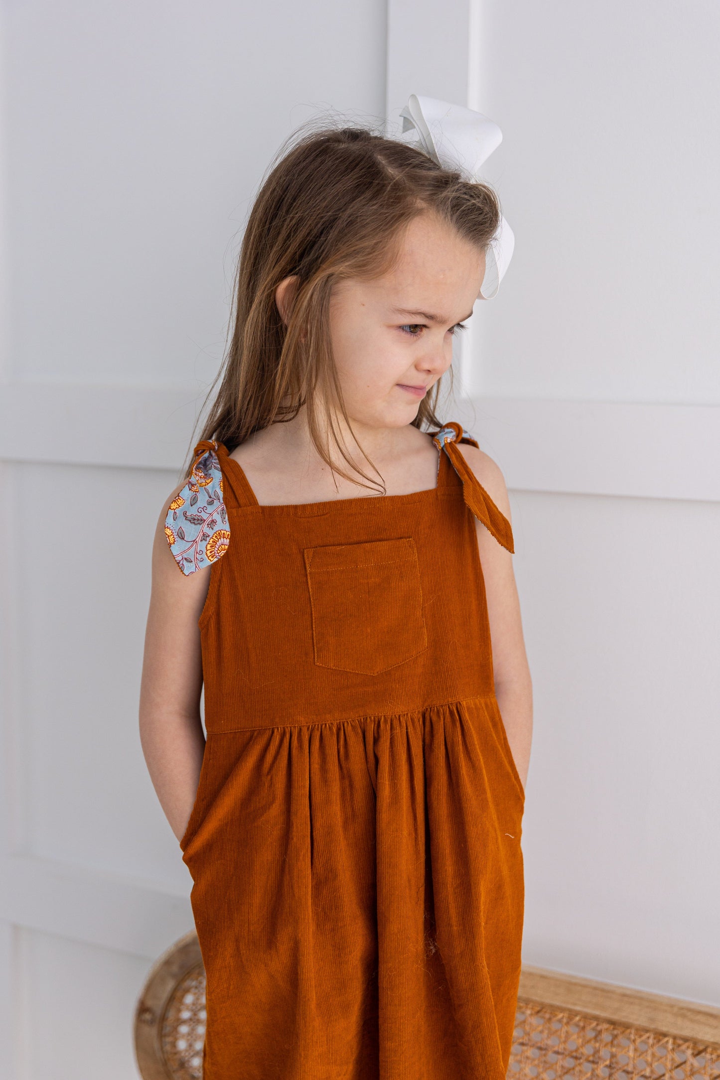 Reversible Solid Rust Corduroy & Rust Floral Printed Ruffle Dress DRESS Yo Baby India