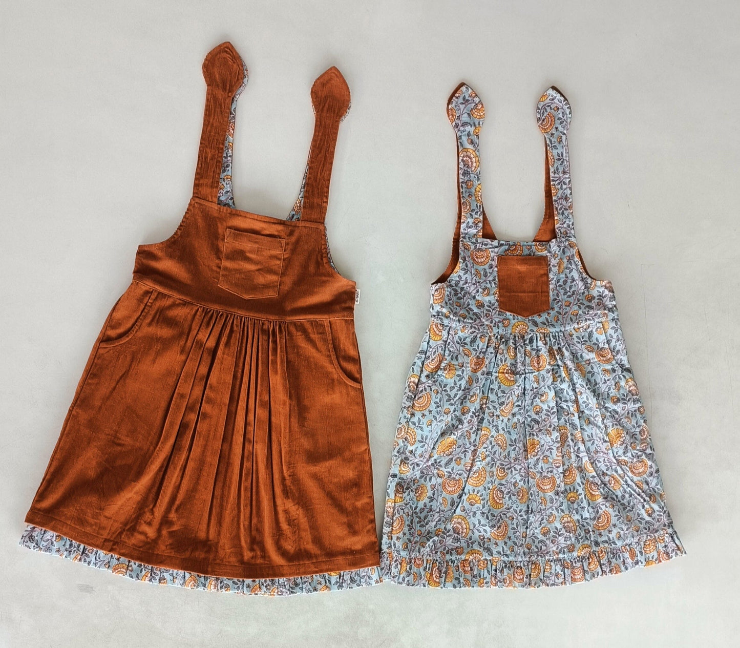 Reversible Solid Rust Corduroy & Rust Floral Printed Ruffle Dress DRESS Yo Baby India