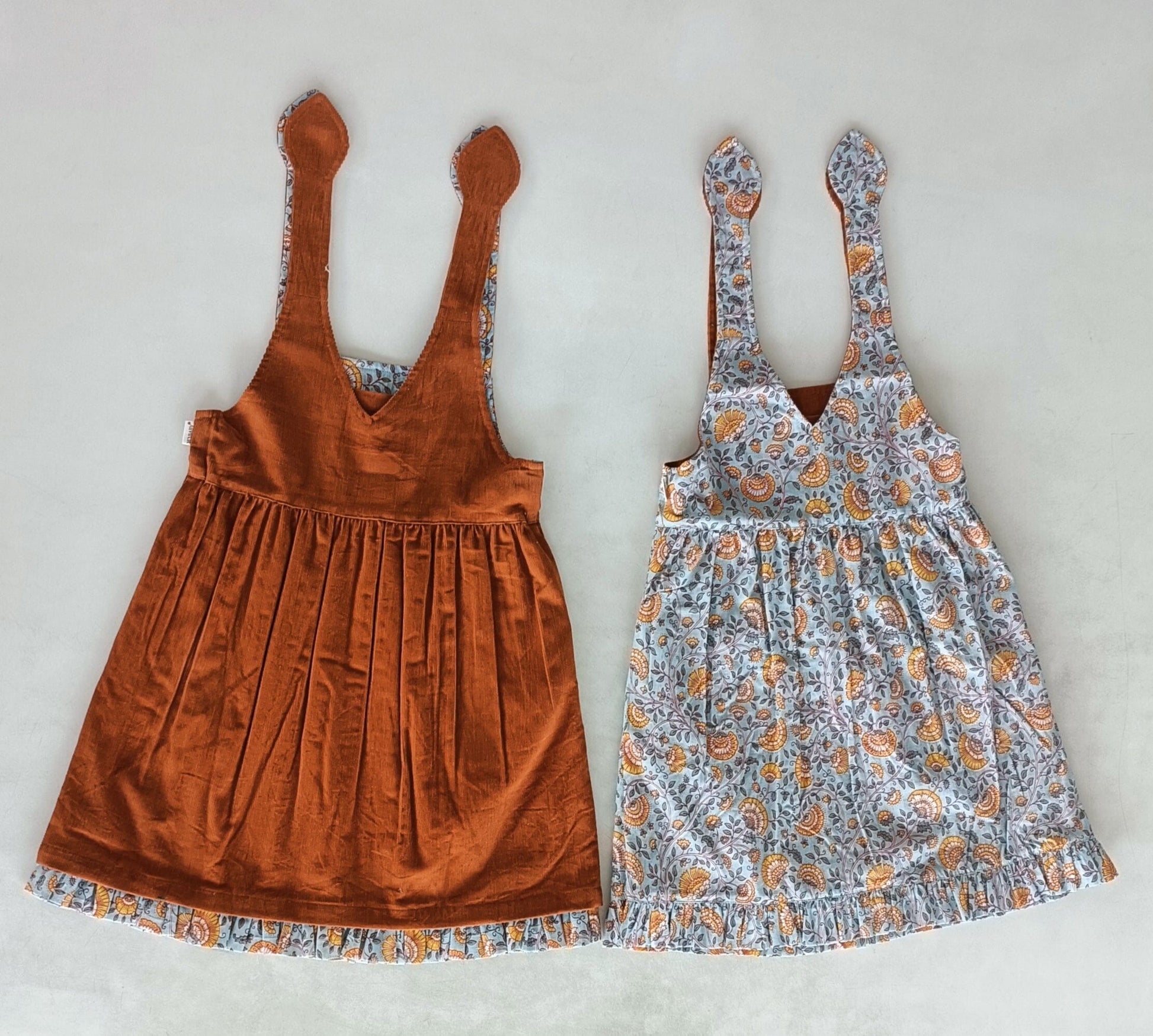 Reversible Solid Rust Corduroy & Rust Floral Printed Ruffle Dress DRESS Yo Baby India