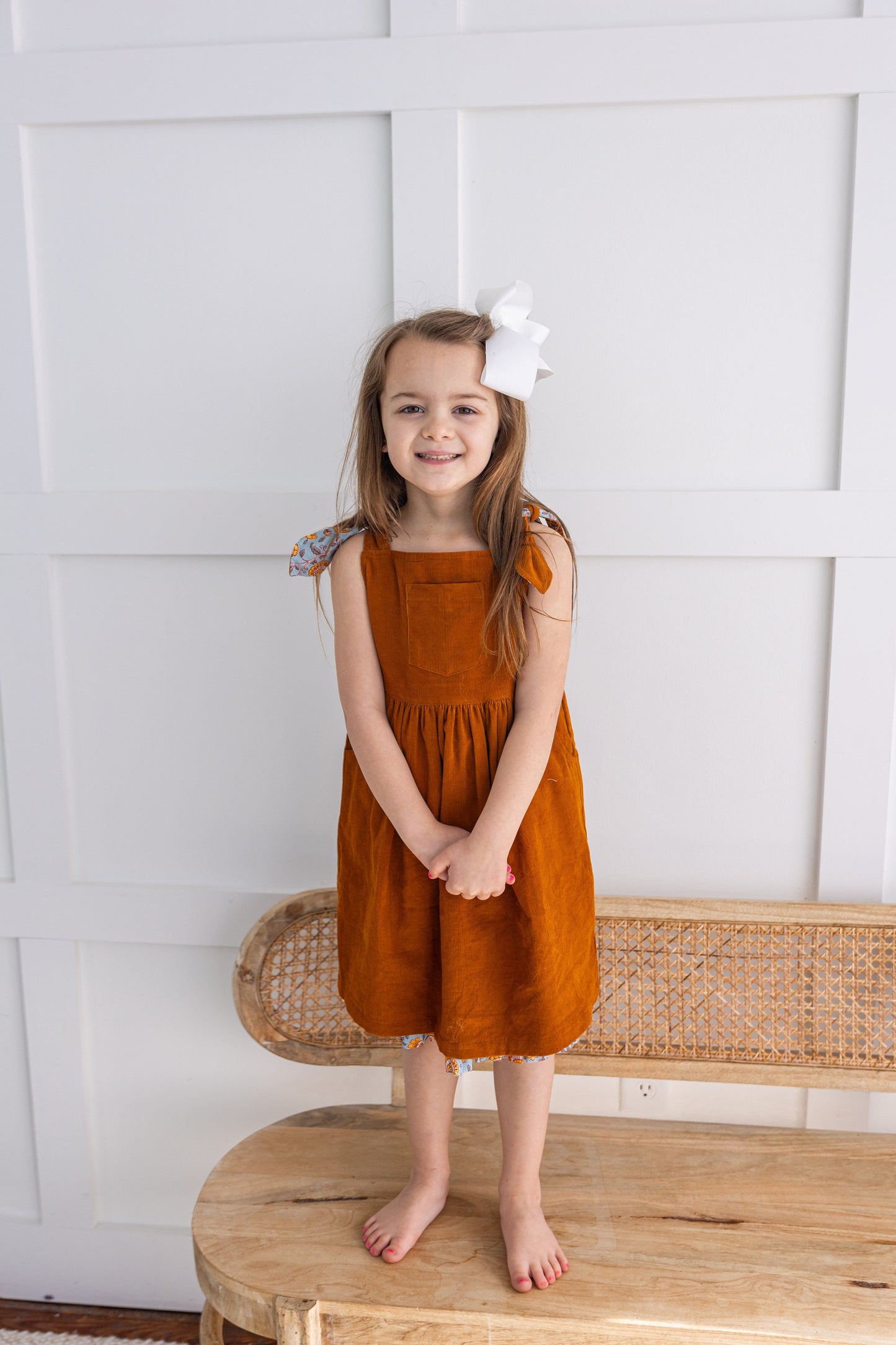 Reversible Solid Rust Corduroy & Rust Floral Printed Ruffle Dress DRESS Yo Baby India