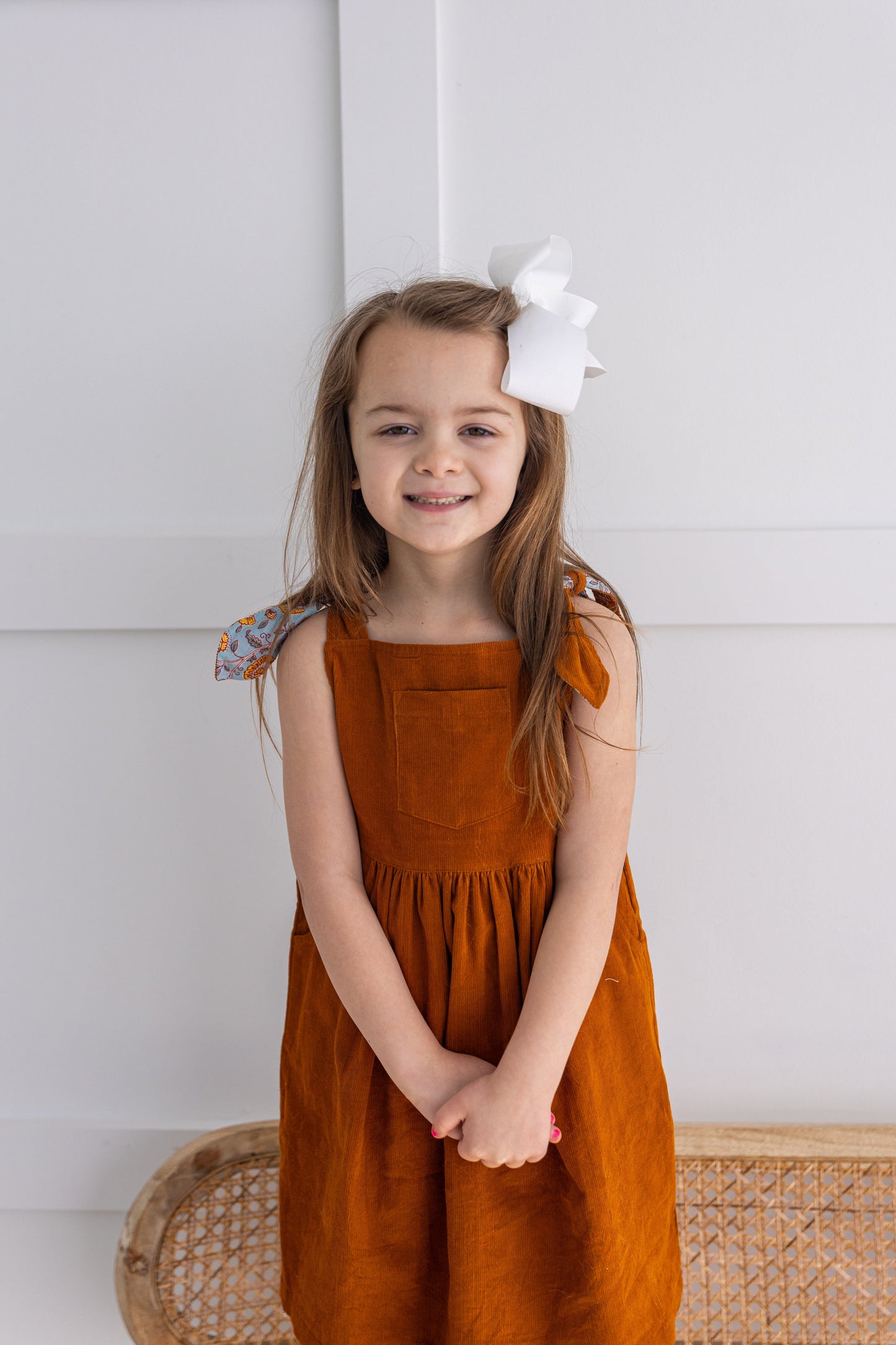 Reversible Solid Rust Corduroy & Rust Floral Printed Ruffle Dress DRESS Yo Baby India