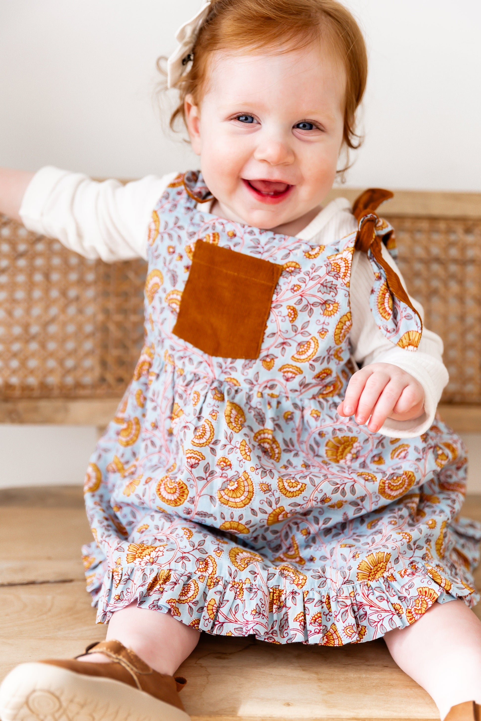 Reversible Solid Rust Corduroy & Rust Floral Printed Ruffle Dress DRESS Yo Baby India