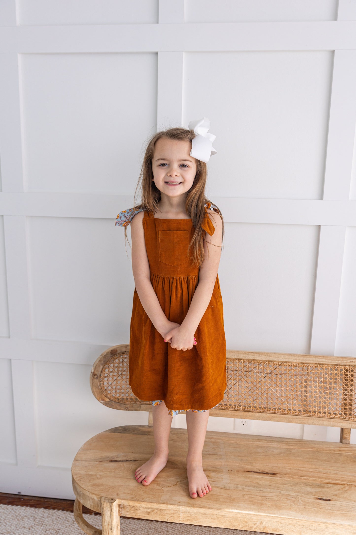 Reversible Solid Rust Corduroy & Rust Floral Printed Ruffle Dress DRESS Yo Baby India