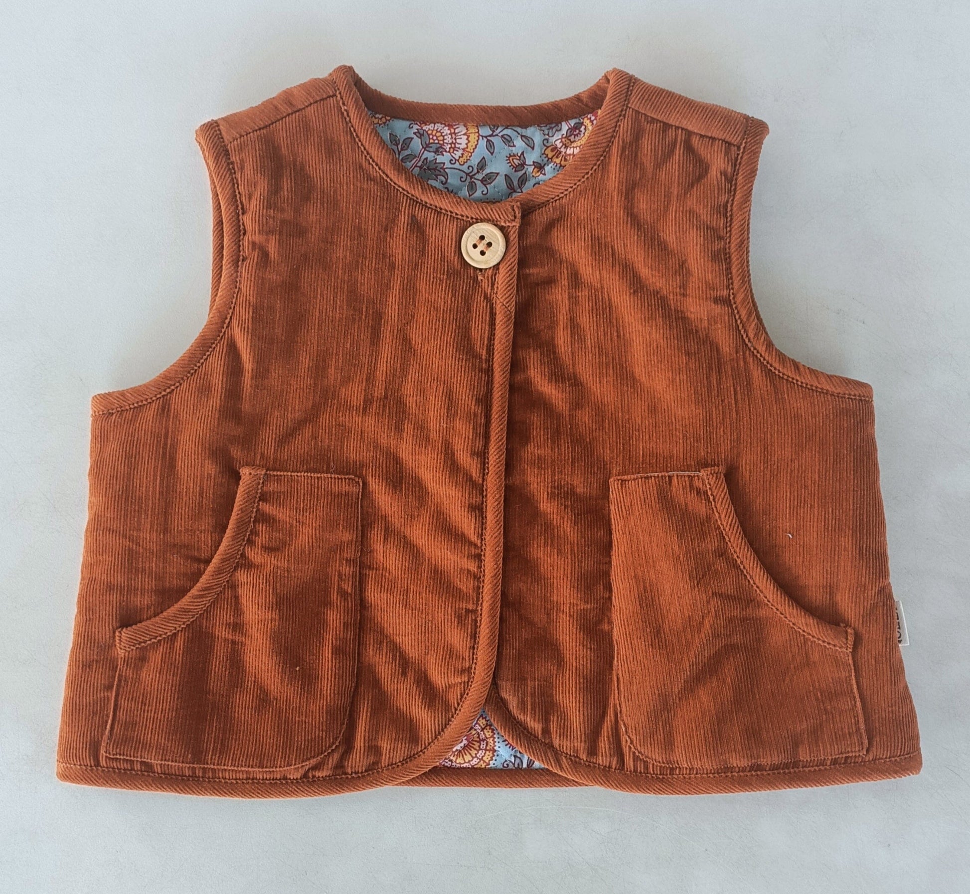 Reversible Rust Corduroy & Blue Floral Print Quilted Sleeveless Jacket jacket Yo Baby Online 